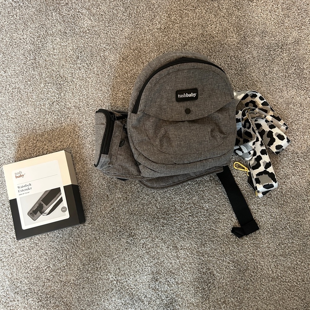 Tushbaby Gray Backpack with Animal Print Strap